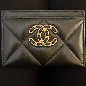 CHANEL Quilted Black Card Holder with Gold Logo